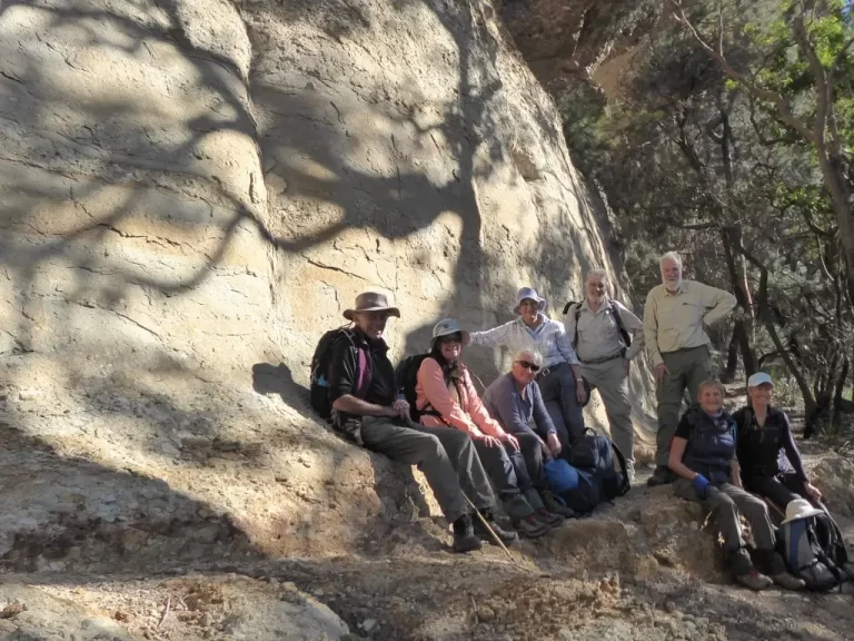 8 happy hikers after descending off Byangee Mountain, Morton National Park